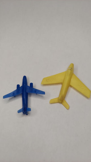 Two 1950s plastic airplanes