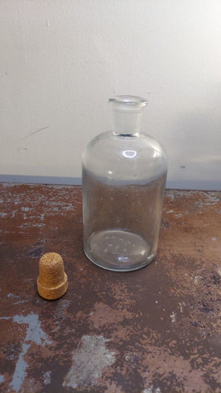 1930s Pharmaceutical laboratory Apothecary clear slight blue glass bottle marked T.C.W. Co. U.S.A. 3-L, T.C. Wheaton Company