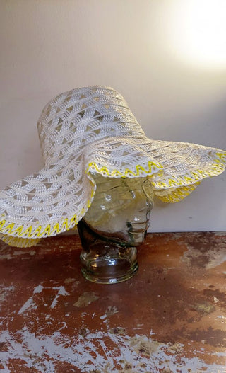 1960s yellow and white woven plastic with lace floppy brim hat made in Taiwan Republic of China.