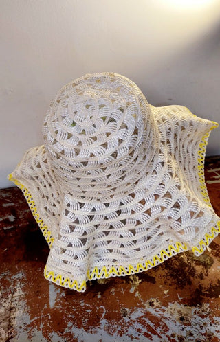 1960s yellow and white woven plastic with lace floppy brim hat made in Taiwan Republic of China.