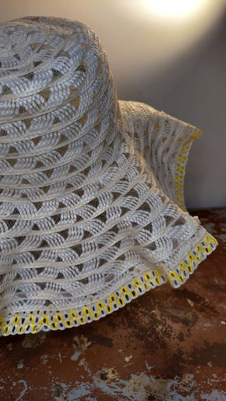 1960s yellow and white woven plastic with lace floppy brim hat made in Taiwan Republic of China.
