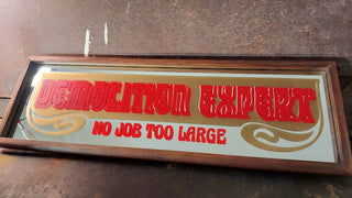 1970s "DEMOLITION EXPERT NO JOB TOO LARGE" mirror by Sanford J. Heilner Inc.  (AS-IS)