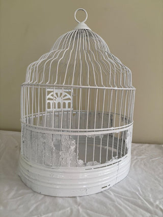 round white metal birdcage