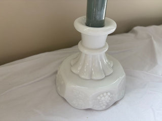 Westmoreland Grape Panel Milk Glass Candlestick with blue candle