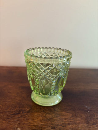 green clear glass votive