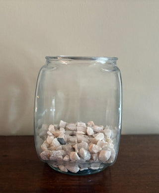 glass fishbowl with stones