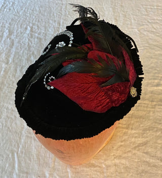 Vintage velvet hat with added skeleton hands