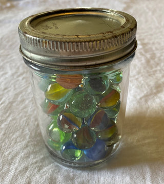 Vintage art glass marbles in mason jar