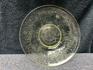 small yellow plate with design