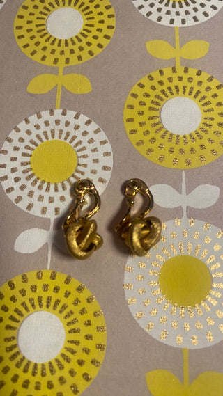Monet gold knot clip on earrings