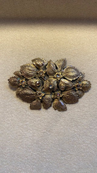 Brass leaves pin with stones