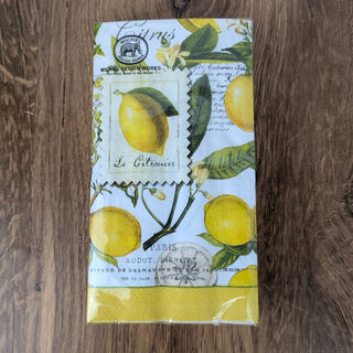 A package of hostess napkins with a lemon and basil design, featuring a vintage style stamp and script.