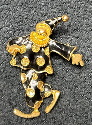 Black/gold jester pin
