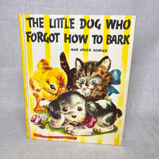 Book cover of 'The Little Dog Who Forgot How to Bark' with illustrations of a dog, cat, and chick on a yellow background.
