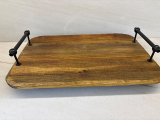 Wooden tray with metal handles on a white background