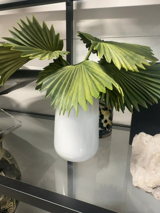 Faux tropical plant in vase