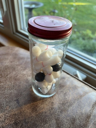 Glass jar w/bowling pins