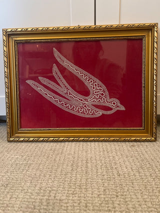 Gold framed Lace Bird with red background