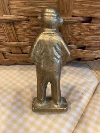 Brass fisherman figure