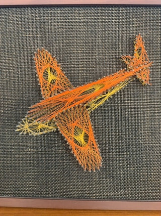 Vintage, string art on board plane