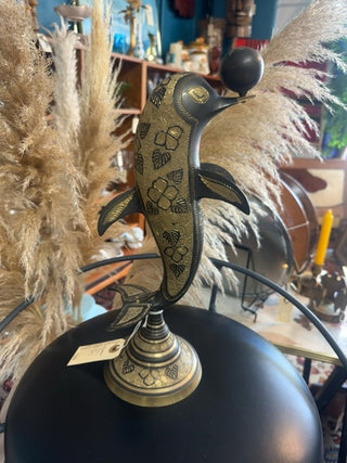 Vintage, brass Mcm sculpture of dolphin with ball.