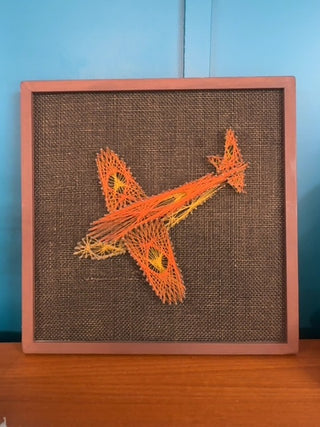 Vintage, string art on board plane