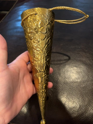 Brass cone wall hanging