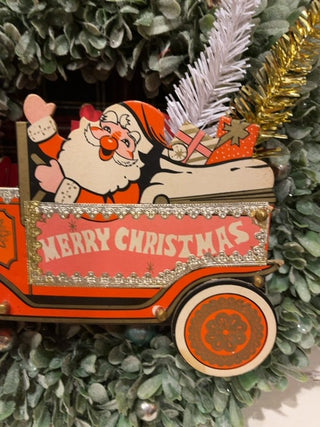 Faux wreath w/paper Santa truck