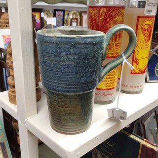 Tall blue green pottery cup