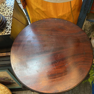 Round dark wood antique table