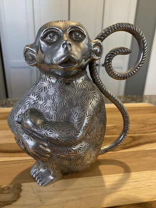 Introspective Silver Monkey Statue