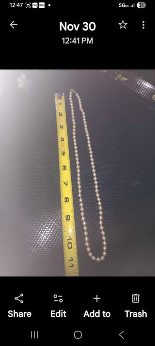 Knotted Pearl?  Neck.