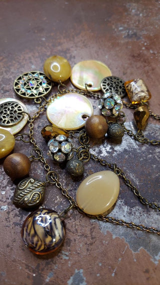 Boho multi-strand necklace with variety of beads and charms, pearl, wood, blown glass, polished stone, etc (T&M)