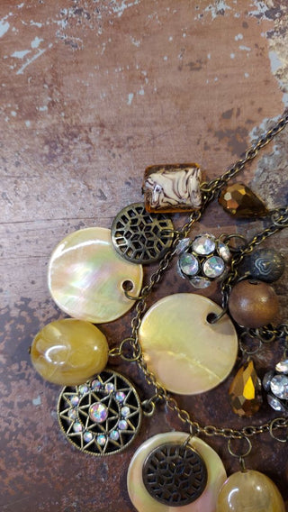 Boho multi-strand necklace with variety of beads and charms, pearl, wood, blown glass, polished stone, etc (T&M)