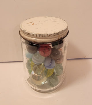 Jar of vintage marbles (white top)