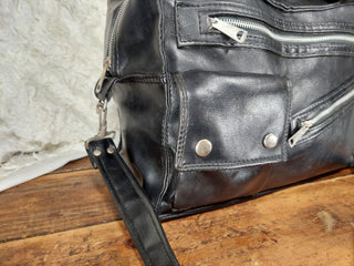 1960s black faux-leather duffel shoulder crossbody bag - Rockabilly Moto Punk Aesthetic. (Travel tote purse luggage- As-Is)