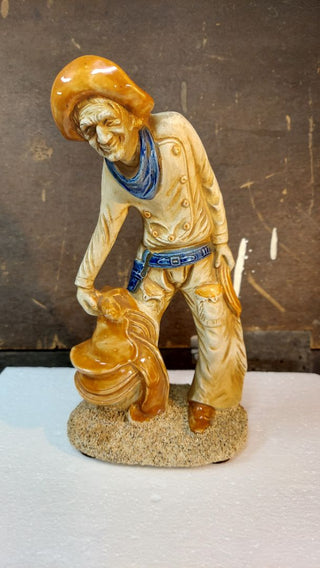Midcentury Saddle Tramp Cowboy Ceramic Figurine - Rustic Folk art Style Hand Painted with textured sand base