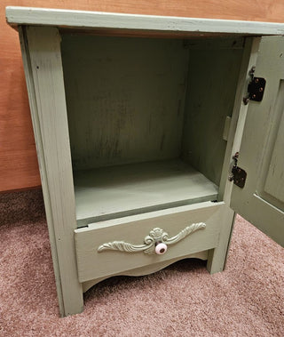 Rustic Painted Wood Cabinet with Drawer & Decorative Fan Motif