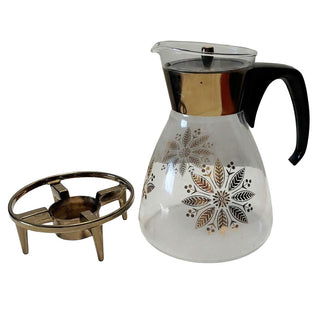 1961 Holiday Addition, Golden Poinsettia Cinderella carafe with tea light base - Pyrex USA