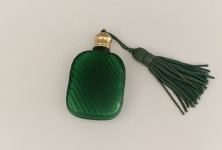 Small pocket perfume bottle with tassels