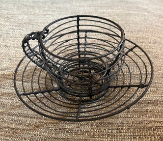 wire teacup and saucer