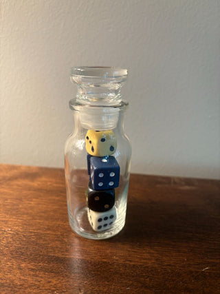 mixed dice in jar