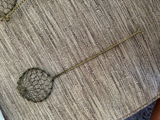 vintage brass sieve