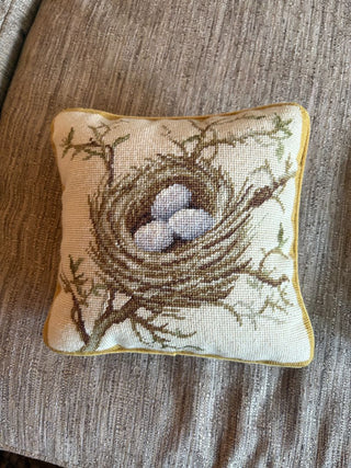 Needlepoint nest pillow