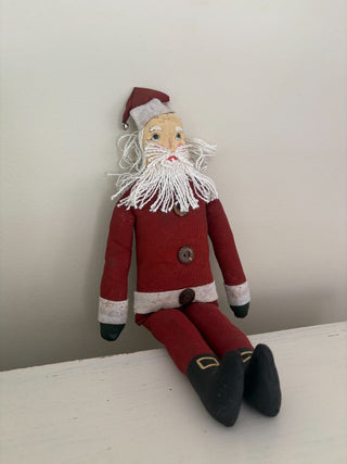 sitting Santa doll