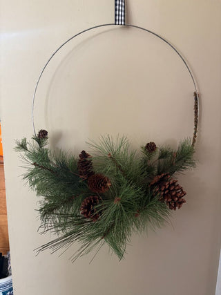 wire wreath with greens