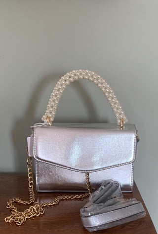 Silver purse w/faux pearl handle plus gold chain and silver strap included