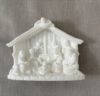 carved stone creche figurine