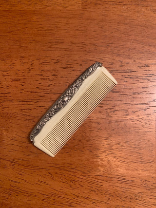 Vtg. small comb w/sterling silver handle