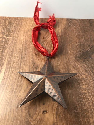 Copper Tone Star Ornament on Red Wire Ribbon